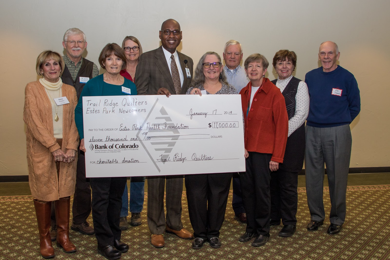 Pictured: (left to right) Diane Scruton (Foundation), Stan Osborne (Foundation), Pam Standard (Quilters), Donna Pierce (Quilters), Kevin L. Mullins (Executive Director, EP Health Foundation), Donna Bryson (Quilters), Rod Unruh (Foundation), Jeanne Allen (Quilters), Joanie Jonell (Quilters) and Ken Zornes (Foundation). 