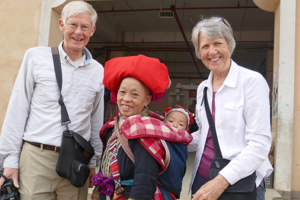 Jim And Karen With Local Woman And Baby In Vietnam 2